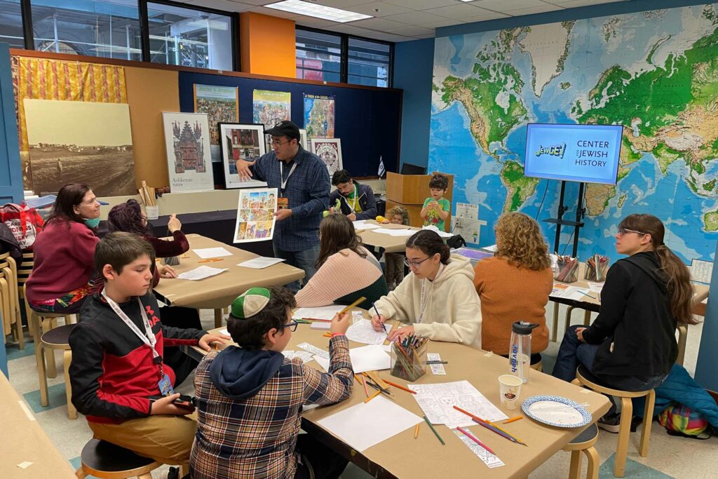 man teaching a comics class.
